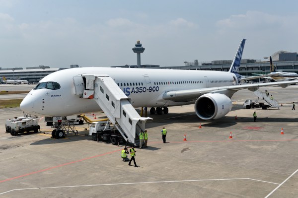 An Airbus A350-900 sits on the tarmac during a media preview at Changi Interational Airport ahead of the Singapore Airshow on Feb. 10, 2014.