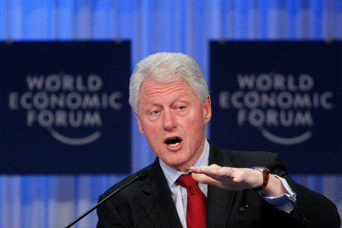 Former U.S. president Bill Clinton attends a session at the WEF in Davos