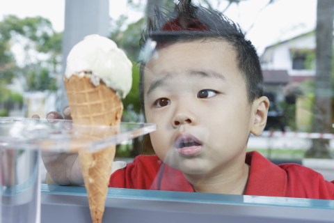 Boy looking at ice cream