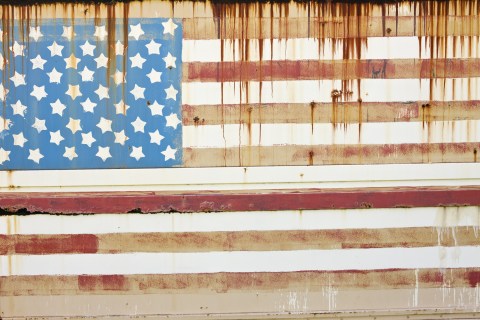 Rusting surface with American Flag painted on it