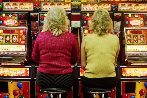Women playing slot machines
