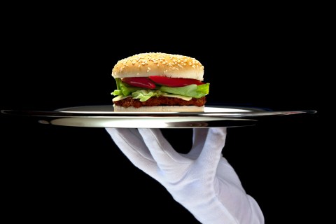 White Gloved Hand Holding Platter with Hamburger