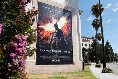 A poster for the Warner Bros. film "The Dark Knight Rises" is displayed in Burbank