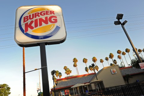 A Burger King sign outside a restaurant