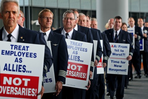 American Airlines pilots and their supporters picket at O'Hare International Airport in Chicago on Thursday, Sept. 20, 2012. 