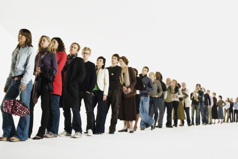 Row of people standing in line