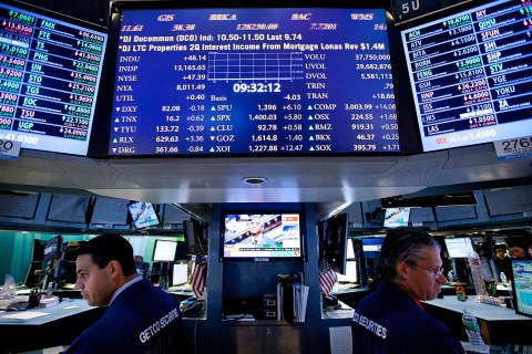 image: Traders work on the floor of the New York Stock Exchange in New York, Aug. 7, 2012. 