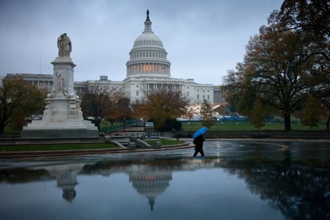 image: The sun rises on a cloudy morning at the Capitol in Washington, Nov. 13, 2012. 