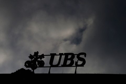 image: The logo of Swiss bank UBS is seen on a building in Zurich, Dec. 19, 2012. 