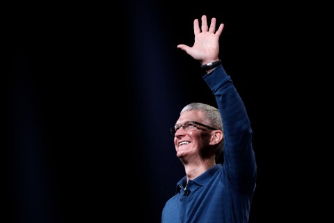 Apple CEO Tim Cook waves to the audience during an Apple event in San Jose