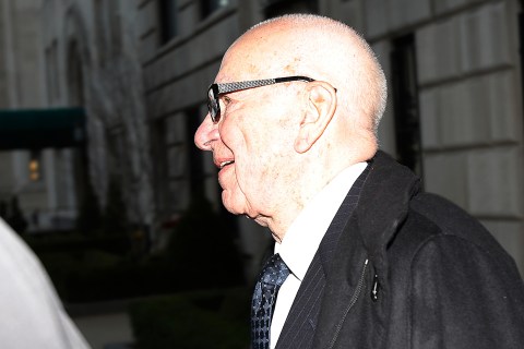 Media mogul Rupert Murdoch leaves his Fifth Avenue home in New York