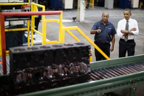 President Barack Obama is shown a truck engine block being manufactured as he tours Linamar Corporation in Arden, N.C, Feb. 13, 2013. 