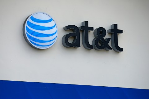 The AT&T logo is pictured by its store in Carlsbad, California