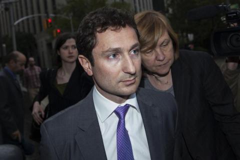 Former Goldman Sachs bond trader Fabrice Tourre  leaves the Manhattan Federal Court in New York
