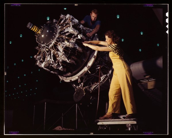 Women are trained to do precise and vital engine installation detail in Douglas Aircraft Company plants, in Long Beach, Calif., in 1942.