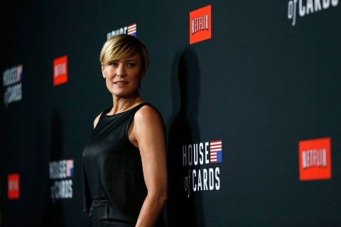 Cast member Wright poses at the premiere for the second season of the television series "House of Cards" at the Directors Guild of America in Los Angeles